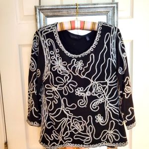 Knit top sz. medium with silver metallic soutache.